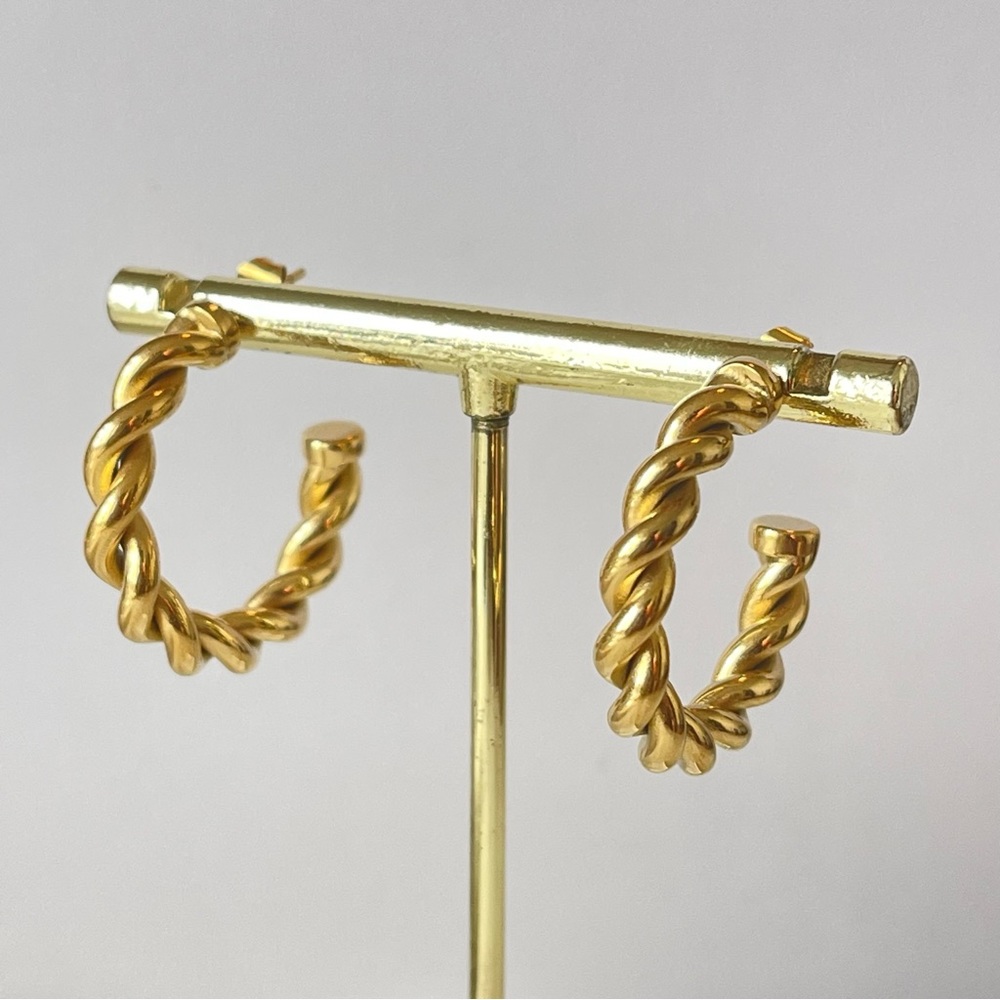 New 18k gold plated, stainless steel hoops. Gold color.